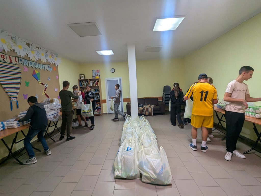 Volunteers packing the food packages at the community center.