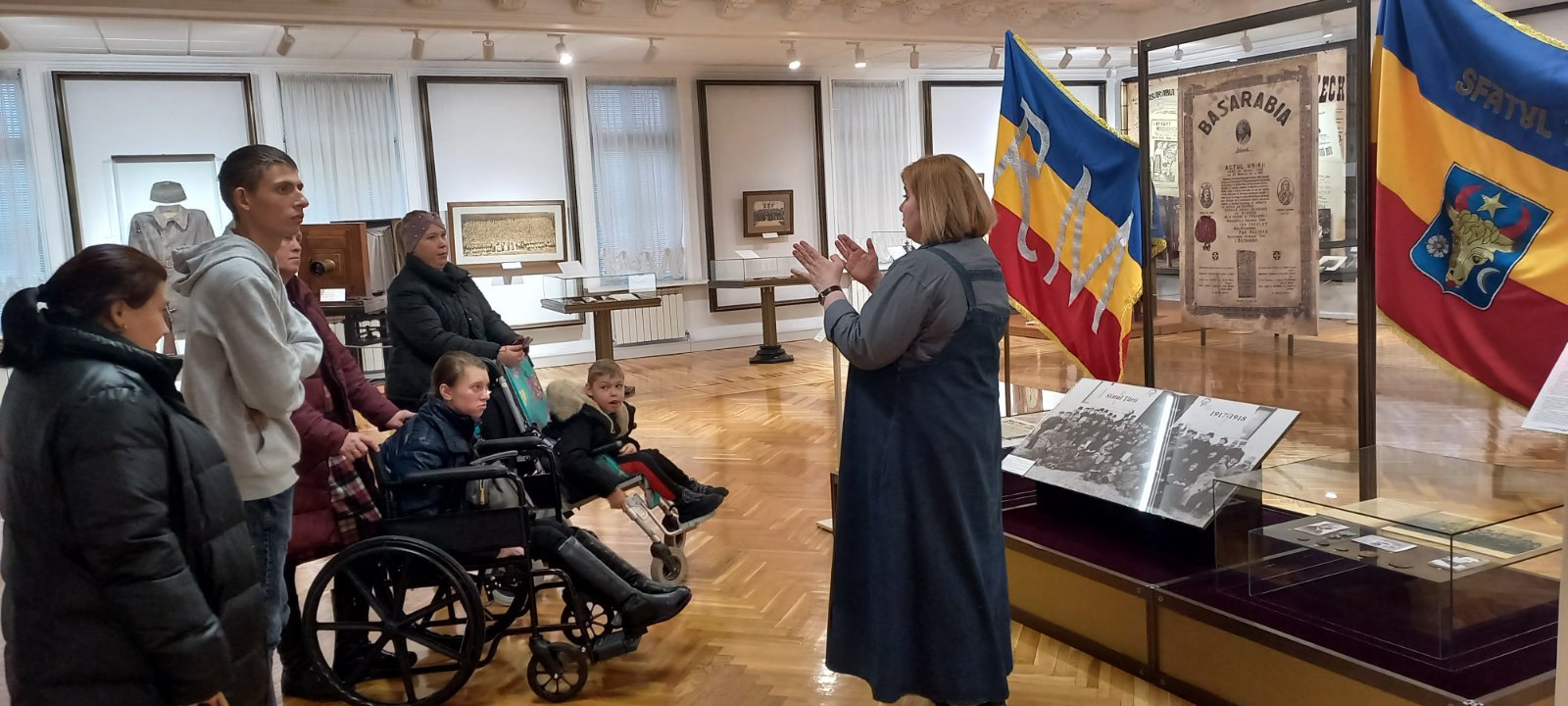 Children with disabilities and their parents enjoying the museum.