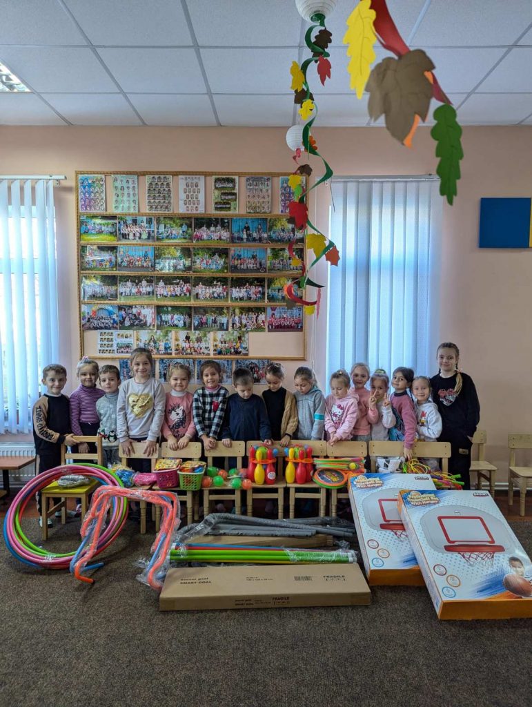 Smiling children with their new toys!