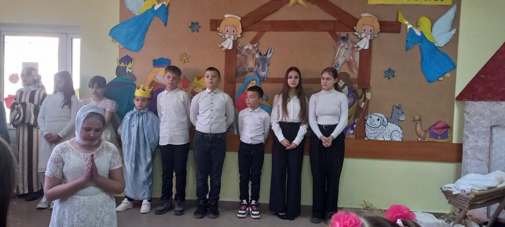 Children performing the Nativity Story at the community center.