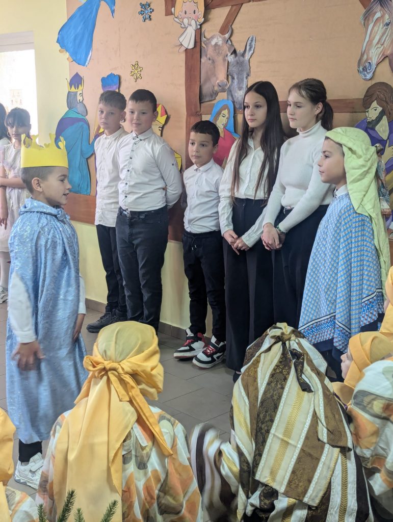 Children performing at the community center.