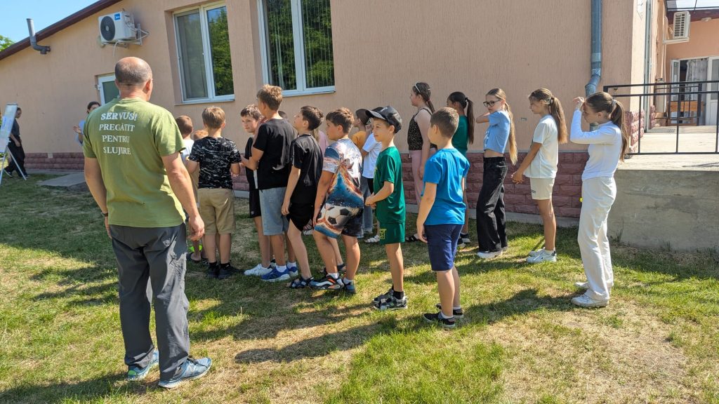 Boys vs girls lined up in a racing game.