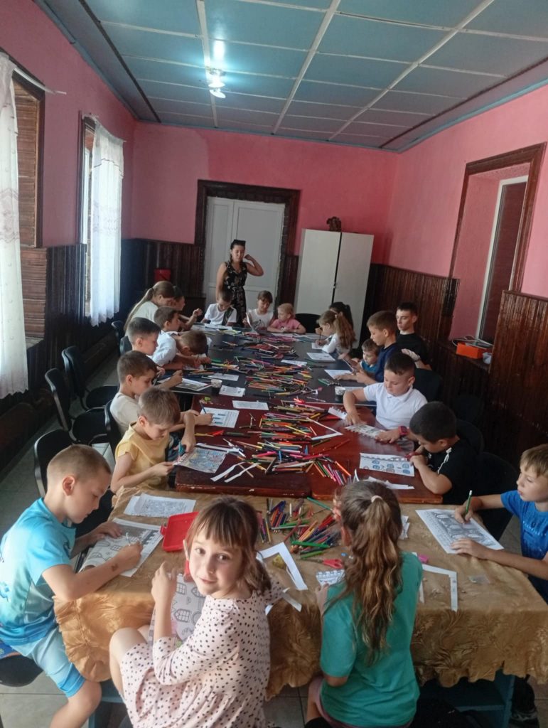 Kids drawing with colored pencils