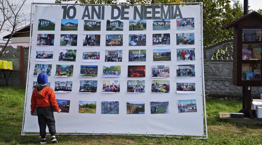 A picture board with images of Neemia activity over 10 years.